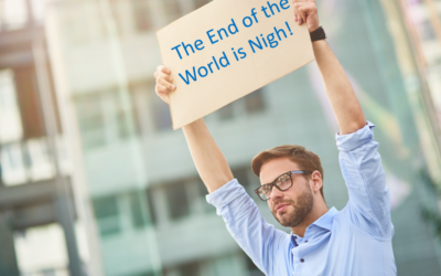 Madman Standing in High Street with Sandwich Board Saying “The End of the World is Nigh!” Revealed to Be Top Climate Change Advisor